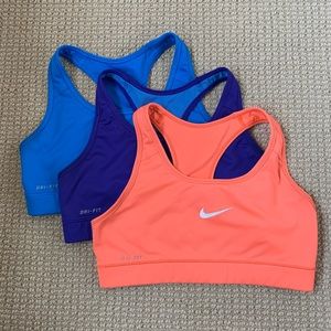 Nike Swoosh Sports Bra in Orange, Purple, and Blue